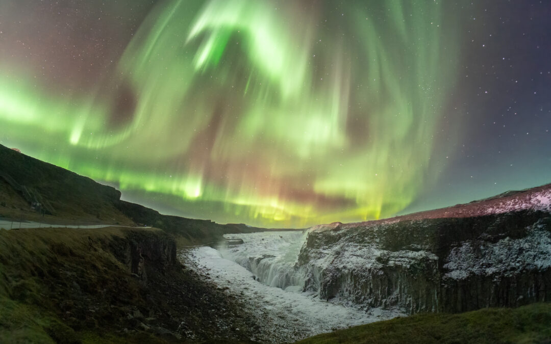 Gullfoss iced waterfall and the aurora, Iceland